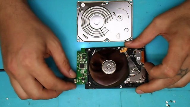 Hard disk drive components under pressure