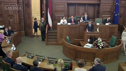 Latvia swears in Edgars Rinkevics, its first openly gay president