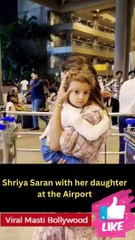 Shriya Saran with her daughter at the Airport