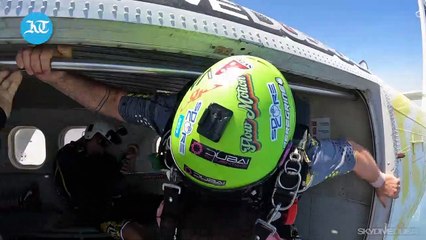 A person of determination goes skydiving to mark her mother's 60th birthday