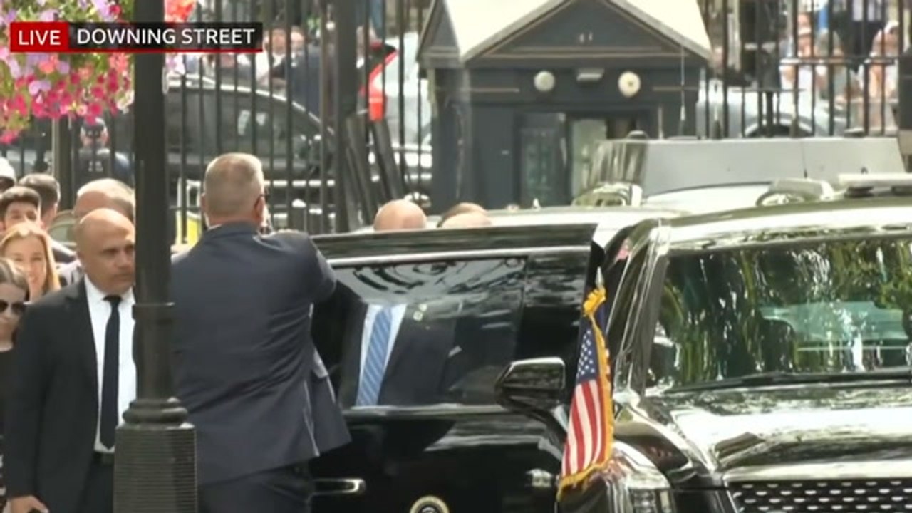 US President Joe Biden arrives in Downing Street to be greeted by UK PM Rishi Sunak