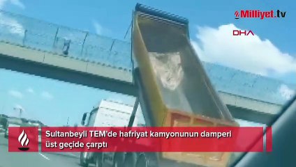 Tải video: Sultanbeyli TEM'de hafriyat kamyonunun damperi üst geçide çarptı