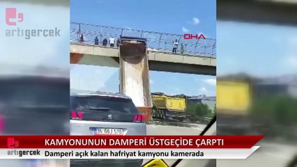 Hafriyat kamyonunun açık kalan damperi üstgeçide çarptı