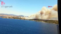 İzmir'de iki ilçede orman yangını: Karadan ve denizden tahliye