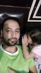 Trishu singing -Lakdi ki kathi close to father ear-dm