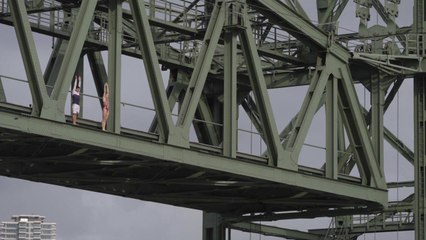 Cliff Divers Paredes and Van Katwijk jump from Hefbrug Bridge in Rotterdam