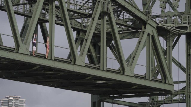 Cliff Divers Paredes and Van Katwijk jump from Hefbrug Bridge in Rotterdam
