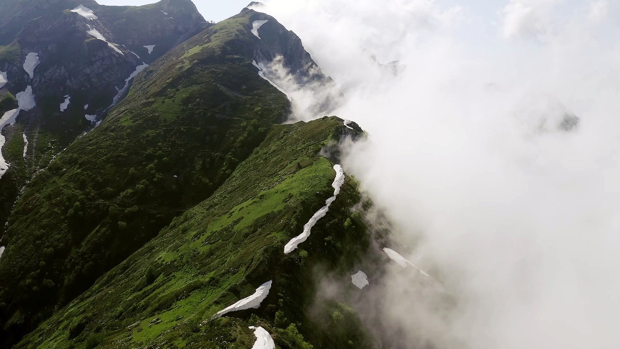 Drone Flying Over The Mountain Peak