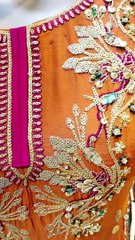 Orange fancy dress with contrast dupatta