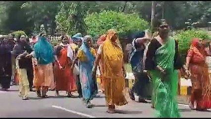 Silence on merger draft, worried residents open protest