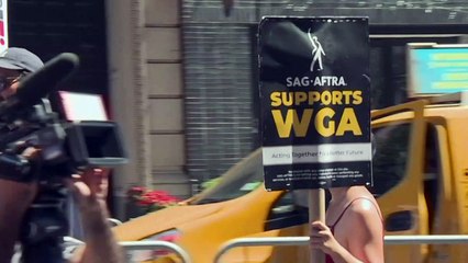 Actors join writers on picket line outside Warner Bros. in New York