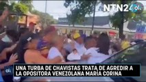 Una turba de chavistas trata de agredir a la opositora venezolana María Corina Machado