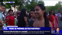 14-Juillet: à Paris, habitants et touristes se préparent au feu d'artifice