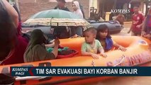 Tim SAR Evakuasi Bayi dan Anak-anak Korban Banjir di Kota Padang