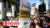 Hollywood actors, writers unite on picket lines