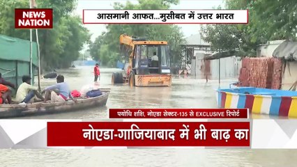 Uttar Pradesh : Noida सेक्टर 135 में पानी में फंसा ट्रैक्टर