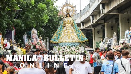 Catholic devotees prepare for the Manila Grand Marian Procession