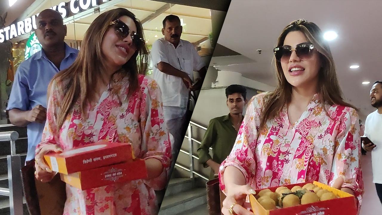 Nikki Tamboli ने Airport पर Paps में बांटे Laddu, Mummy के पीछे लगाई दौड़ | Video Viral | FilmiBeat