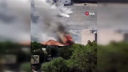 Makilik alanda çıkan yangın eve sıçradı