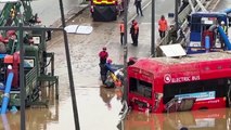 Victims pulled from flooded South Korea underpass