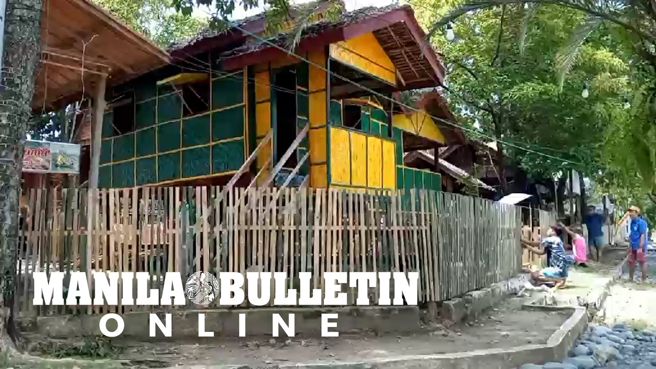 Sama tribe at Kadayawan Village repair their traditional house