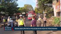 Polisi Beri Helm pada Pengendara Tertib dalam Sosialisasi Operasi Patuh Candi
