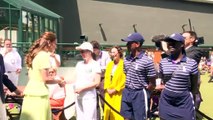 Beaming Kate presents the Wimbledon women's trophy to an emotional Czech Marketa Vondrousova after consoling tearful opponent Ons Jabeur with a hug - as the winner now plans on celebrating with a beer and another tattoo!