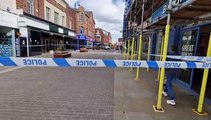 Police tape off section of High Street, Kettering