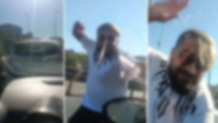 Hamile kadının bulunduğu arabayı böyle yumrukladı