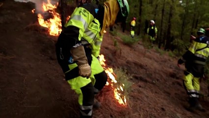 La Palma firefighters battle to control wildfires as thousands forced to evacuate
