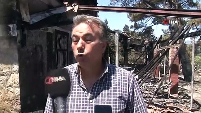 Hatay'ın Belen ilçesinde çıkan yangında evler ve araçlar yandı