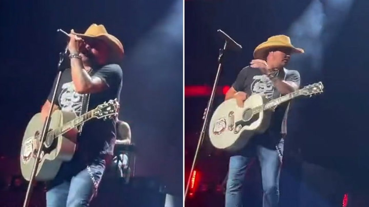 Moment country singer Jason Aldean runs off stage after suffering heat stroke