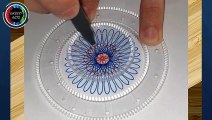 DIBUJANDO una flor de pétalos azules-blancos y centro rojo. (Usando un espirógrafo). DRAWING a flower with blue-white petals and a red center. (Using a spirograph).