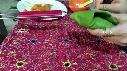 Quail wrapped in banana leaf and grilled on charcoal1