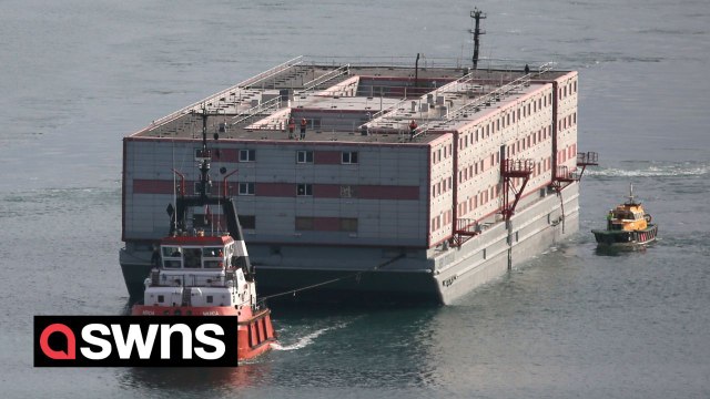 Floating accommodation block the Bibby Stockholm arrives in Portland to protests from locals