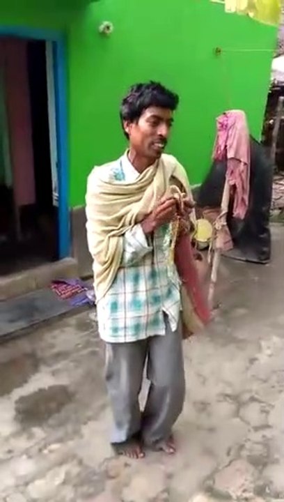 A Begar boy singing with music