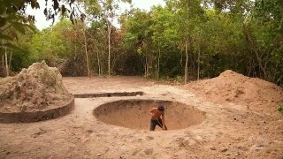 Building underground hut with grass roof & fireplace with clay.