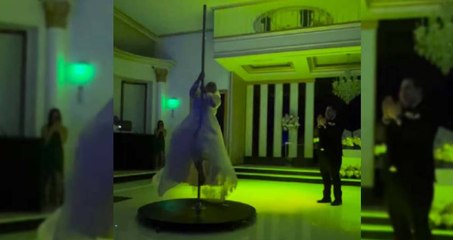 Tesettürlü gelin, düğününde direk dansı yaptı