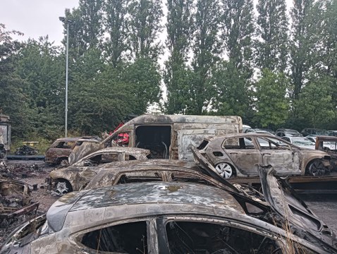 Firefighters battling huge blaze as 50 vehicles go up in flames