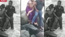 La mère de trois enfants est morte par les vagues alors qu'elle posait pour une photo au bord de la mer.