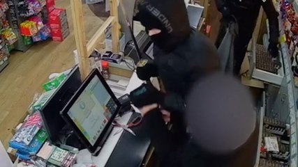 Download Video: Samurai sword-wielding robbers chased away by brave customer during Leeds shop raid