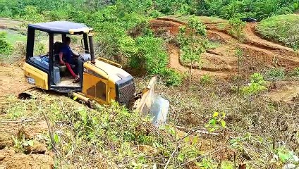 Bulldozer Creates Terrace at the Top of the Mountain CAT D5K XL
