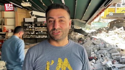 Adana'da depremde hasar alan bina kontrollü yıkım sırasında devrildi