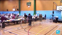 Ruling UK Conservatives suffer vote routs but avoid wipeout