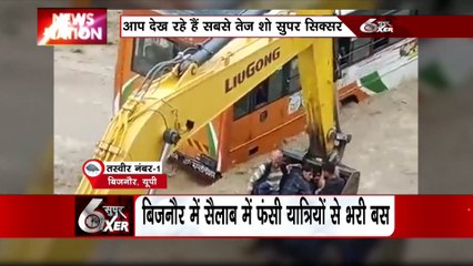 बारिश के बाद मैदानी इलाकों में बाढ़ जैसे हालात, बिजनौर में फंसी बस