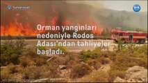 Orman yangınları nedeniyle Rodos Adası'ndan tahliyeler başladı
