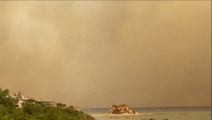 Greece: Smoke turns Rhodes sky grey and hazy as wildfires continue to rage