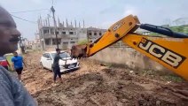 JCB pulled out a car stuck in the mud