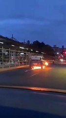 Flaming Car Pulls Over