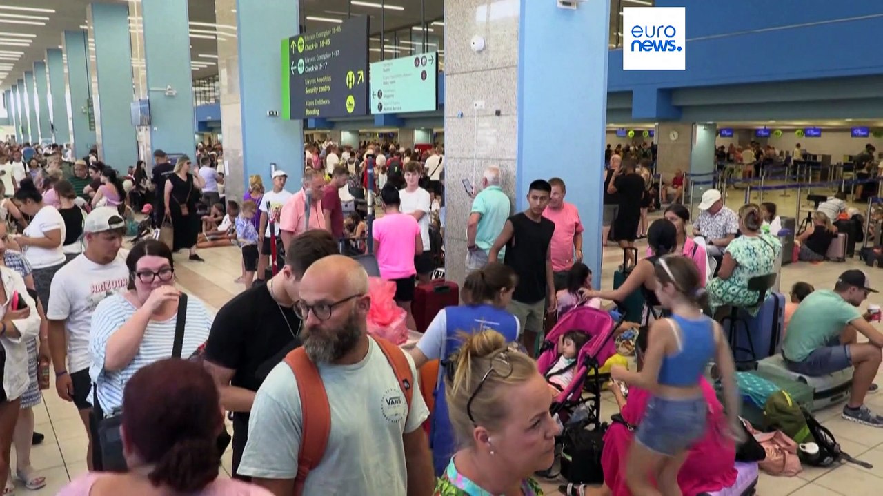 Fire still blazing on the Greek island of Rhodes as dozens more erupt across the country